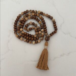 Elegant Brown Beaded Necklace with Tassel